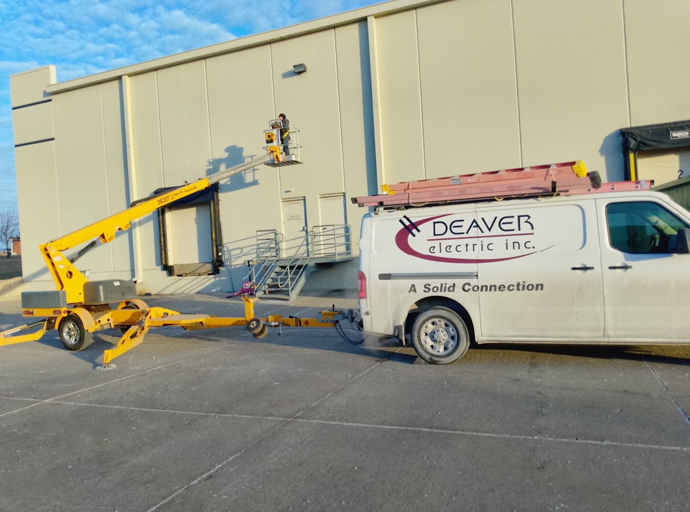 Deaver Electric van and lift on a commercial job